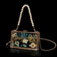 Floral Pearl Chain Epoxy Clutch thumbnail
