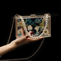 Floral Pearl Chain Epoxy Clutch thumbnail