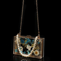 Floral Pearl Chain Epoxy Clutch thumbnail