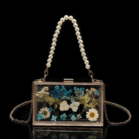 Floral Pearl Chain Epoxy Clutch thumbnail