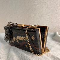 Statement Black Epoxy Clutches with Real Dried Flowers thumbnail